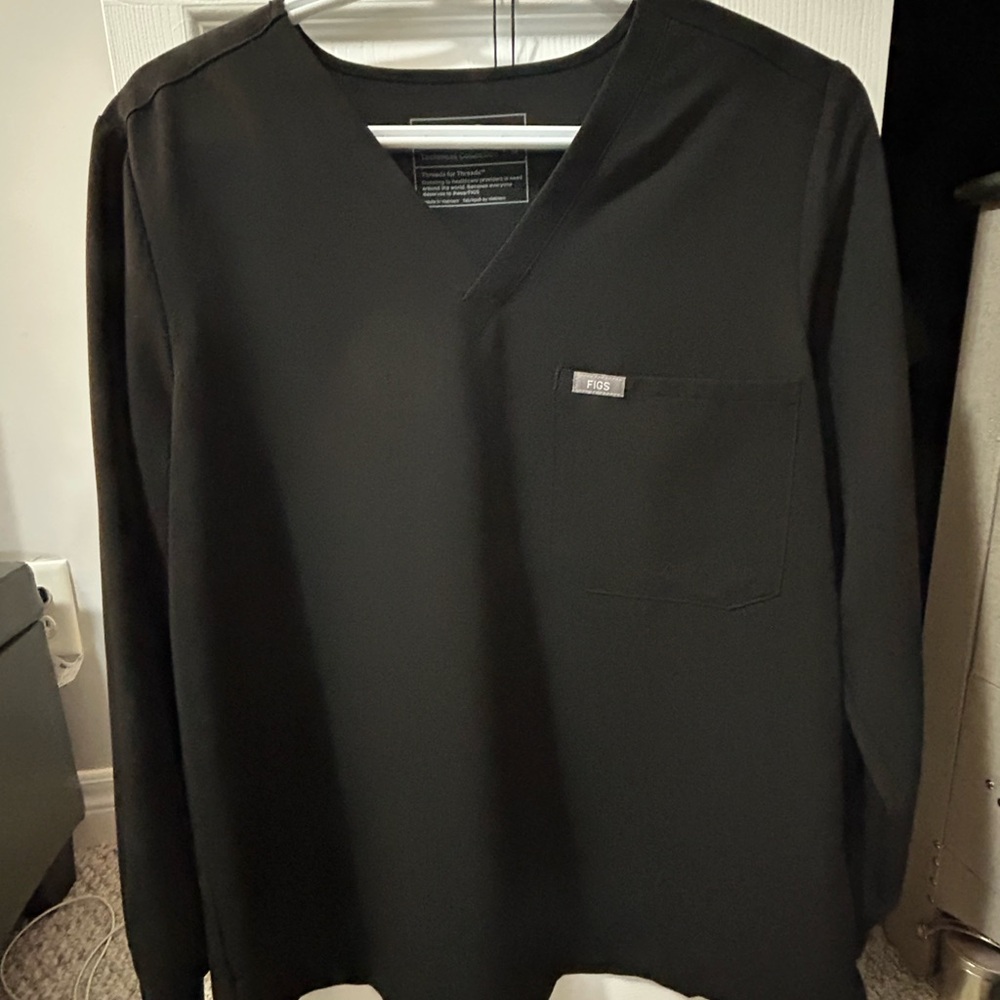 Figs long sleeve one pocket scrub top in black.